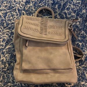 Grey leather backpack